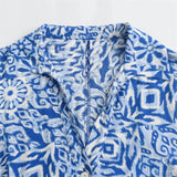 Vestido Capri Mediterrâneo™ com Estampa Exclusiva e Cinto Marrom / Um Charme Europeu com Toque Brasileiro!