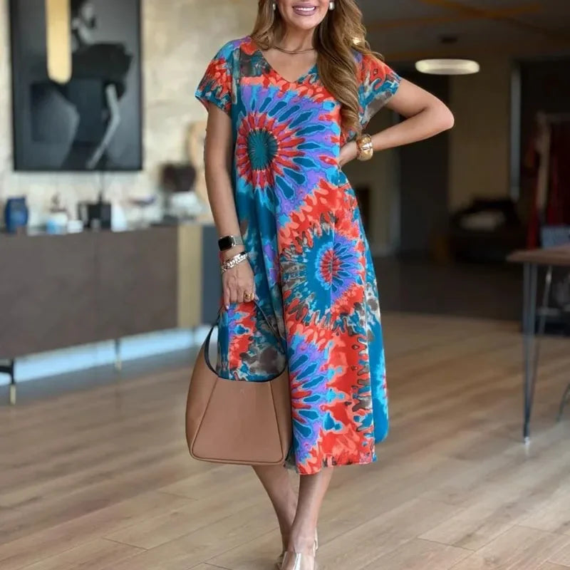 Vestido SunDance™ em Viscose Premium com Estampa Artística e Caimento Solto / Movimento, Cor e Feminilidade Sem Esforço!