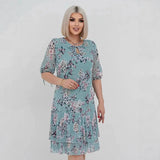 Vestido Évelyne™ com Estampa Floral Delicada e Mangas 3/4