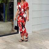 Vestido Tropicana™ em Malha Leve com Toque de Elastano / Gola Polo Sofisticada e Amarração na Cintura para Um Ajuste Perfeito!