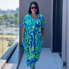 Vestido Oceania™ Em Viscose com Corte Amplo e Estampa Tropical / A Peça que Une Conforto e Beleza Sem Esforço!