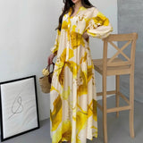 Vestido Marrakesh™ Longo com Estampas Artísticas e Mangas Bufantes
