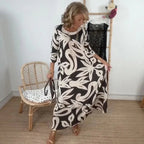 Vestido Mídi Longo Nerina™ com Estampa Floral Abstrata / A Elegância Solta que Inspira Liberdade!